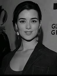 Cote de Pablo ( Singer )