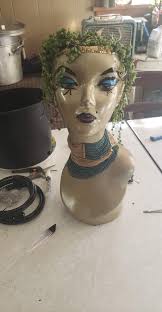 Upcycled Mannequin Head Planter for Spider Plant in UK Garden