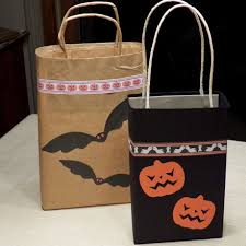 Spread the newspaper out on the work table and take out one entire sheet (i.e., two attached pages). How To Make Easy Trick Or Treat Bags Halloween Crafts Aunt Annie S Crafts