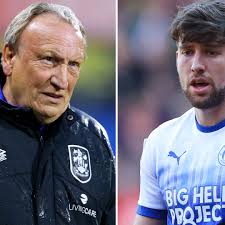 Huddersfield boss Neil Warnock looks to tie up quick transfer deal for  relegated Wigan ace Callum Lang