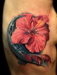 33 Hibiscus Flower Tattoos With Unique And Colorful Meanings Tattooswin Hibiscus Tattoo Hibiscus Flower Tattoos Flower Tattoo On Ribs