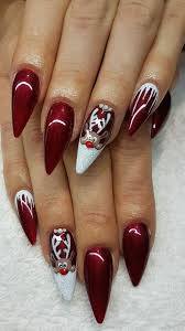 Amazing red christmas acrylic nails coffin shaped design consists of candy cane nails, snowflake nails, and adorned with glitter. Matte Cute Christmas Coffin Nails Matte
