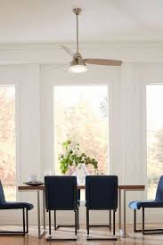 Teal & orange flower arrangement for the dining room. Yay Or Nay Ceiling Fan Over The Dining Table At Home In Love Dining Room Ceiling Fan Lights Over Dining Table Modern Dining Room