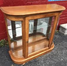 Browse our collection of curio cabinets and consoles. Lot Art Contemporary Wood Glass Curio Display Cabinet