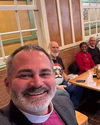 The Chancery celebrated its annual Christmas luncheon with Bishop Mulvey,  and we were delighted to welcome Bishop Emeritus Carmody as well. Along  with enjoying fellowship and food, we also extend our heartfelt