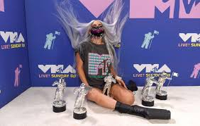 1.the red hooded bodysuit she wore on trl in 2008. Lady Gaga Die 9 Spektakularen Looks Der Mtv Vma Gewinnerin Vogue Germany