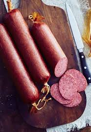 Jalapeño cheddar smoked sausage made from scratch with sharp cheddar cheese and fresh jalapeños, ground pork, beef and smoked bacon. Homemade Summer Sausage Step By Step Illustrated Instructions Venison Summer Sausage Recipe Summer Sausage Recipes Homemade Sausage
