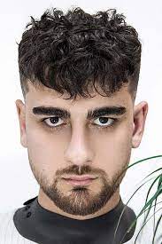 The macho · short curly hairstyles for men · 10 สไตล์ทรงผม undercut ที่คนส่วนใหญ่มักจะคัดลอกสไตล์มาใช้ในยุคปัจจุบัน · long undercut | ไอเดียสำหรับหนุ่มที่อยากไว้ผมยาว.แต่ก็อยากตัดผม. 55 Latest Short Curly Hairstyles For Men To Keep Your Crazy Curls On Trend Wavy Hair Men Haircuts For Men Curly Hair Men