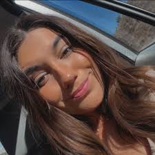 What is the story of the older gentleman waving at the Ammon Walmart stop  light?