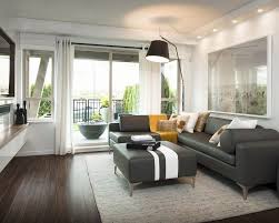 Dark Brown Wood Laminate Flooring With Grey Sofa And Soft Table Completed Fur Rug Living Room Wood Floor Living Room Hardwood Floors Elegant Living Room Design