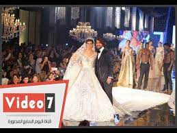 كشفت الفنانة يسرا اللوزي عن تفاصيل مشاركتها في مسلسل بين السما والارض المقرر عرضه فى موسم دراما. ÙŠØ³Ø±Ø§ Ø§Ù„Ù„ÙˆØ²Ù‰ ØªØ±ØªØ¯Ù‰ ÙØ³ØªØ§Ù† Ø²ÙØ§Ù Ù…Ø±ØµØ¹ Ø¨Ø§Ù„Ù…Ø§Ø³ Ù…Ù† ØªØµÙ…ÙŠÙ… Ù‡Ø§Ù†Ù‰ Ø§Ù„Ø¨Ø­ÙŠØ±Ù‰ Youtube