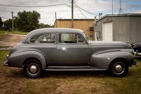 Image result for Titian Maroon 1940 Oldsmobile