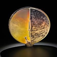 Throwback to 10 years ago! Here's a look at the cold working process for  Lunar Light Dune. Carving through layers of color and cane with diamond and  stone wheels—one cut at a