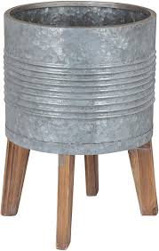 Plant stands can help organize the way you present your. Amazon Com Kate And Laurel Gavri Casual Farmhouse Galvanized Metal Planter With Rustic Wood Stand Furniture Decor