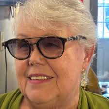 Refugee daughter carries biological sister to church