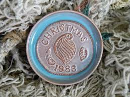 1983 Merritt Island Pottery Coaster, Melvin Casper Potter. Casper made a  different design for many years as a special Christmas collectible. Sold.