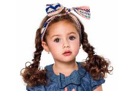 This hairstyle is one of the best girl's hairstyles for school. 19 Cutest Hairstyles For Curly Hair Girls Little Girls Toddlers Kids