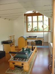 10 Amazing Garage Makeovers Creative Ideas For Garages Pilates Yoga Studio Pilates Studio Garage Makeover