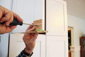 Ikea offers two heights for the upper cabinetry: How To Install Cabinet Knobs With A Template A Trick For Avoiding Costly Mistakes The Happy Housie