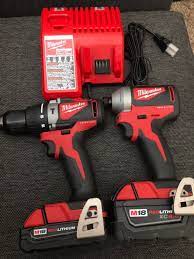 Milwaukee M18 Brushless Hammer Drill And Impact Driver With 2 0 And 4 0 Battery New M12 M18 Charger Included Hammer Drill Milwaukee M18 Milwaukee Tools