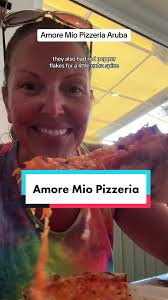 This place was delicious!! We will definitely be back! Met some super nice  ppl at the table next to us too! Boyfriend got the Tropicalina drink and  the Bolognese pizza! #aruba🇦🇼 #arubavacation ...