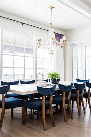 Our slat side chairs with wood seats will fit in beautifully. White Wood Dining Table With Blue Velvet Dining Chairs Transitional Dining Room Benjamin Moore Gray Mist