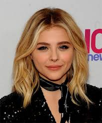 Chloe Grace Moretz Medium Wavy Honey Blonde Hairstyle