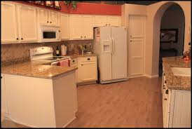 Cream Colored Cabinets With Brown Glaze Wallpaper Hd Kitchen Design Ideas White Kitchen Appliances White Appliances Kitchen Cabinet Inspiration