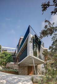 We are contemplating buying a house, and adding a two car detached garage, pole barn construction. Timber Lined Walkway Allows Breeze Into Australian Beach House By David Boyle