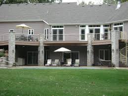 A walkout basement costs about $20,000 more than a regular full basement and requires extra. Deck Over Walkout Basement Pictures Walk Out Basement With Pool Patio And Deck Above Walk Out Basements Pool Patio Terrace Fence Design