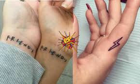 'german' tattoo on her left arm. Minimalist Tattoo Inspiration