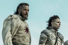 Like a contented hallmark movie character, britt happily lives in the same city she grew up in. Travis Fimmel And Niamh Algar Loved Their Raised By Wolves Characters Big Twist Decider