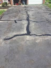 How To Fill Driveway Cracks Driveway Repair Asphalt Driveway Patio Privacy Screen