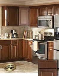 10x10 Kitchen Starts At 1 842 Hampton Bay Cabinets At Home Depot Color Cognac Dark Brown Kitchen Cabinets Brown Kitchen Cabinets Kitchen Cabinet Design