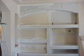 Gypsum company makes the official trademarked brand. Sheetrock Vs Drywall Low Cost Drywall Drywall Repair Rustic Living Room