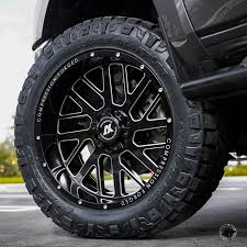 Black And Blue Tis Wheels Axe Compression Forged 2 0 Blk Milled Wheels Wrapped On Nitto Ridge Grappler Tires Champion 4x4 Where Champions Are Built 786 502 3446 2644 W 84th St Hialea