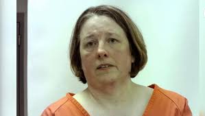 CAUGHT: Officials said an Oklahoma woman was charged after she allegedly  laundering nearly $1.5 million in funds obtained through online romance  scams.