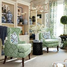 On ballard designs website, they had a whole article on what their cabinet could be used for. Jane Embroidered Ikat Pillow Ballard Designs Blue And Green Living Room Home Decor Living Room Green