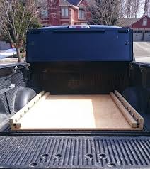A wooden drawer that fits along the entire length of the truck! Diy Bed Slide Ford Truck Enthusiasts Forums Truck Bed Box Truck Accessories Diy Truck Bed Organization