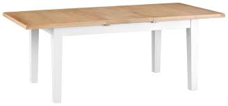 Its construction is simple to use with the engineered wood featuring a smooth aluminium mechanism that glides open easily to extend the table. Colesbourne White Painted Large Extending Dining Table George Street Furnishers