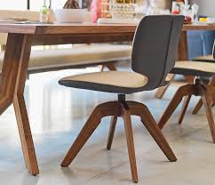 Beautiful Luxury Two Tone Leather Dining Chair With A Swivel Wood Base Swivel Dining Chairs Dining Chairs Leather Dining Chairs