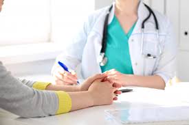 Portrait of careless smiling doctor physician posing at camera. How To Manage Your Private Practice And Have Fun Ornatopia