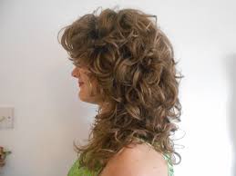 Look cute with a sock bun and then have some awesome curls when you take it down. Handy Lady How To Do A Diy 70s Shag Farrah Fawcett Haircut Yourselfin A Few Easy Steps
