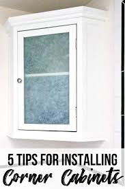 To do this you'll need to know what size door you'll be using for the large unit. How To Install A Small Bathroom Corner Cabinet The Handyman S Daughter