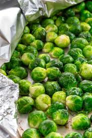 Chop half of the root from the brussel sprouts, then remove the top layer of the sprout. Roasted Brussels Sprouts Jessica Gavin