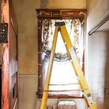 Thin some joint compound until it is spreadable, and roll it onto an area of the wall with a roller. Stripping Wallpaper In The Bathroom Making It Lovely