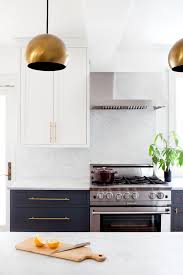 Gray kitchen cabinets with black hardware. 9 Gorgeous Kitchen Cabinet Hardware Ideas Hgtv