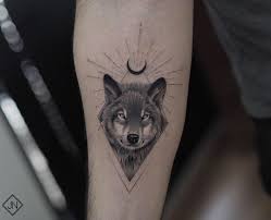Wolf staring at the moon by one other advantage or sun and moon tattoo designs is that no one knows what it actually even if a moon tattoo holds meaning, it can easily be lost in case of small tattoos or decorative tattoos. Moon And Wolf Tattoo Design Small Wolf Tattoo Wolf And Moon Tattoo Wolf Tattoo Forearm