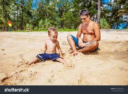 Boy Dad Playing Sand On Beach Stock Photo 322855685 | Shutterstock