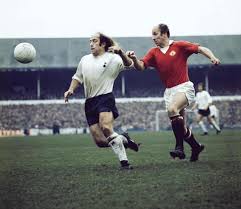 Ralph Coates giving Bobby Charlton the run around at the Lane.